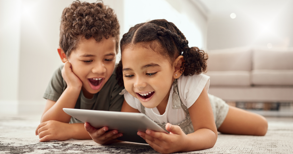 young children on tablet device